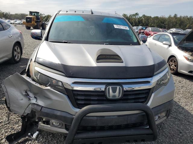 Photo 5 from auction – 2017 HONDA RIDGELINE with VIN 5FPYK3F79HB005947
