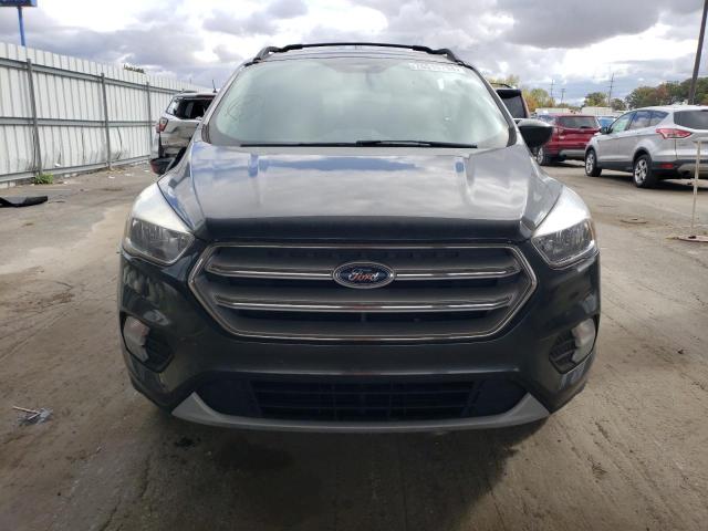 Photo 5 from auction – 2018 FORD ESCAPE SE with VIN 1FMCU0GD3JUB51656