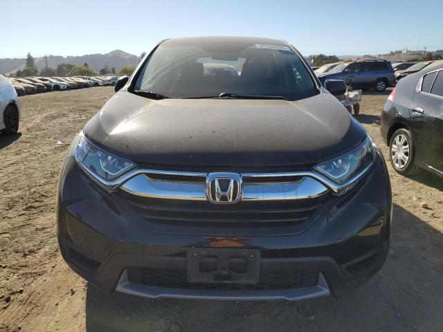 Photo 5 from auction – 2017 HONDA CR-V LX with VIN 7FARW5H33HE009133