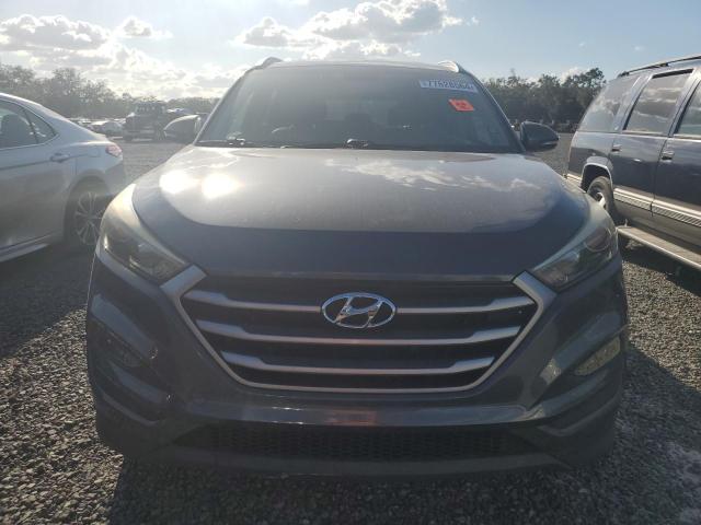 Photo 5 from auction – 2017 HYUNDAI TUCSON LIM with VIN KM8J3CA46HU509427