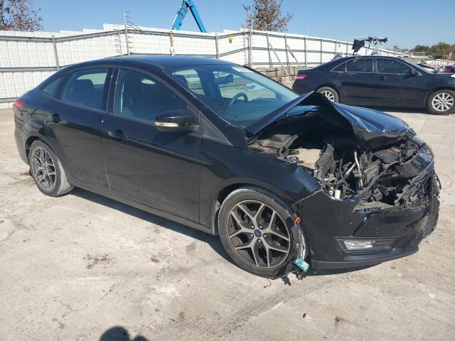 Photo 4 from auction – 2017 FORD FOCUS SE with VIN 1FADP3FE7HL295163