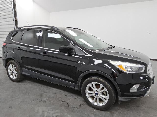 Photo 4 from auction – 2018 FORD ESCAPE SE with VIN 1FMCU0GD8JUC49825