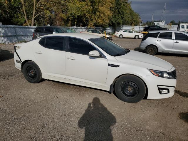 Photo 4 from auction – 2014 KIA OPTIMA LX with VIN KNAGM4A79E5519013