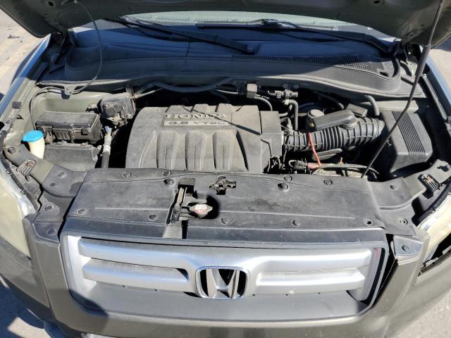 Photo 12 from auction – 2006 HONDA PILOT EX with VIN 5FNYF18486B025088