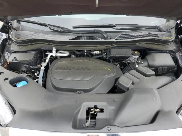 Photo 12 from auction – 2023 HONDA RIDGELINE with VIN 5FPYK3F58PB067451