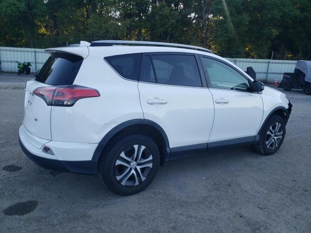 Photo 3 from auction – 2018 TOYOTA RAV4 LE with VIN JTMZFREV0JJ212293