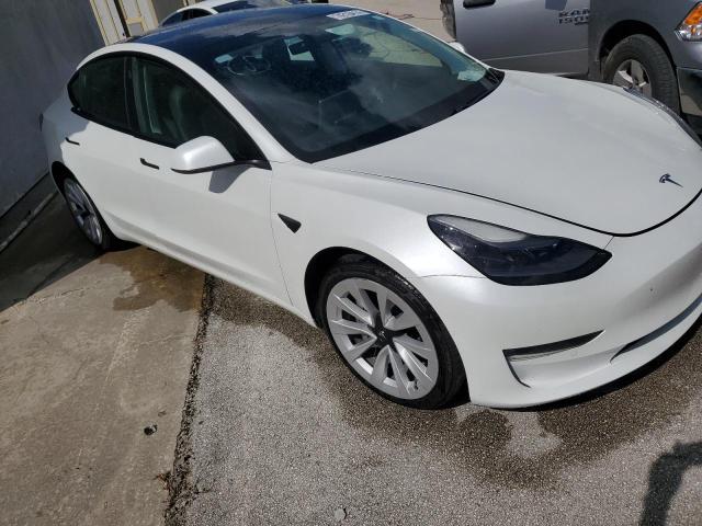 Photo 4 from auction – 2021 TESLA MODEL 3 with VIN 5YJ3E1EB9MF924345