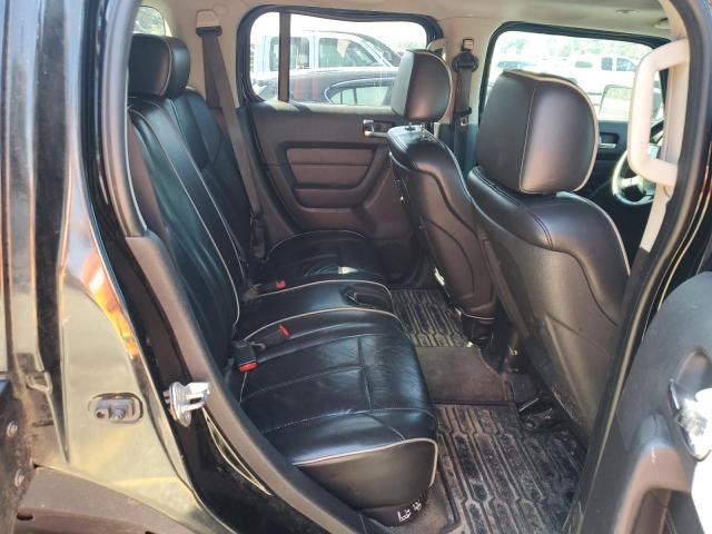 Photo 11 from auction – 2009 HUMMER H3 with VIN 5GTEN13E098160892