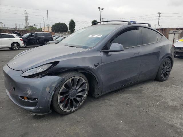 TESLA MODEL Y 2022 with VIN 7SAYGDEF9NF405384 - Photo from auction