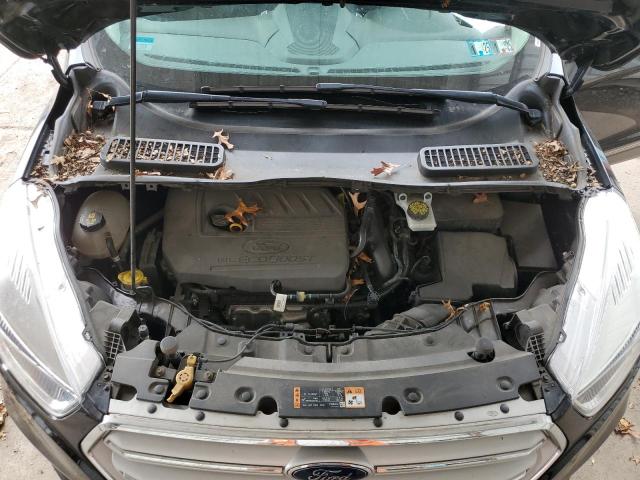 Photo 11 from auction – 2018 FORD ESCAPE SE with VIN 1FMCU9GD9JUC77475