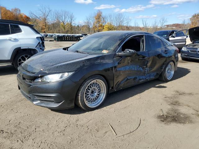 Photo 1 from auction – 2018 HONDA CIVIC LX with VIN 2HGFC2F54JH561395