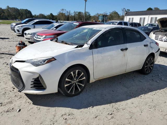 TOYOTA COROLLA L 2017 with VIN 2T1BURHE3HC871395 - Photo from auction