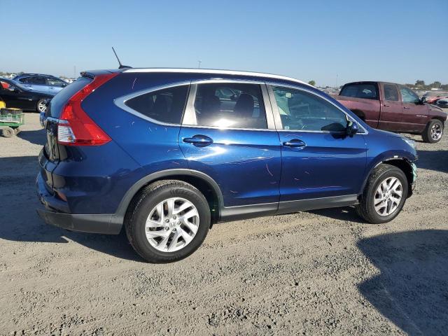 Photo 3 from auction – 2015 HONDA CR-V EXL with VIN 2HKRM4H70FH633050
