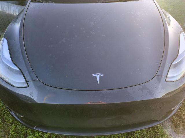 Photo 12 from auction – 2024 TESLA MODEL Y with VIN 7SAYGDEE3RA252026