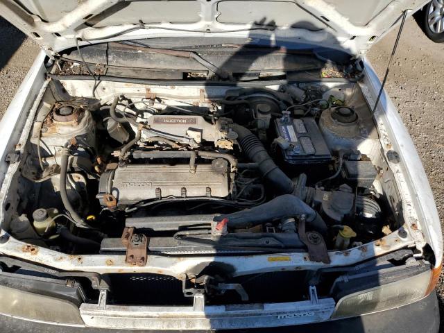 Photo 11 from auction – 1992 MAZDA 323 BASE with VIN JM1BG2327N0440754