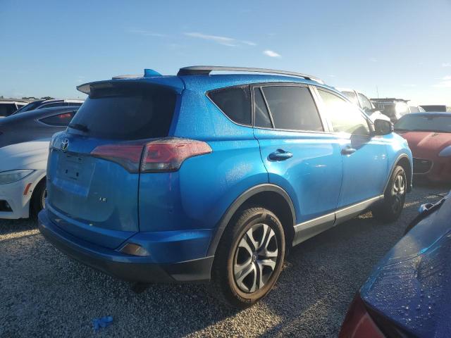 Photo 3 from auction – 2017 TOYOTA RAV4 LE with VIN JTMZFREV8HJ715161
