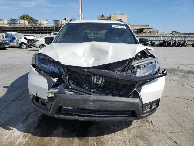 Photo 5 from auction – 2021 HONDA PASSPORT E with VIN 5FNYF8H01MB036372