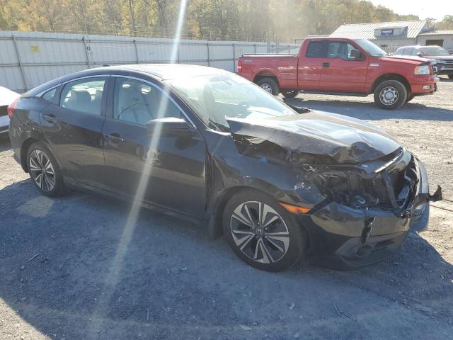 Photo 4 from auction – 2016 HONDA CIVIC EX with VIN 2HGFC1F32GH648083