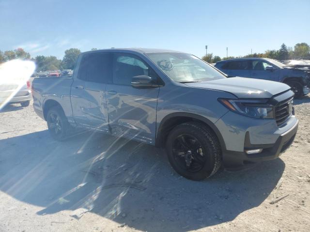 Photo 4 from auction – 2023 HONDA RIDGELINE with VIN 5FPYK3F88PB040972