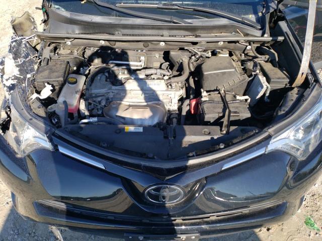 Photo 12 from auction – 2018 TOYOTA RAV4 LE with VIN 2T3BFREV1JW827082