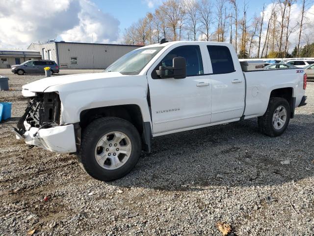 CHEVROLET SILVERADO 2018 with VIN 2GCVKREC6J1107907 - Photo from auction