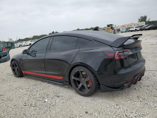 Photo 2 from auction – 2021 TESLA MODEL 3 with VIN 5YJ3E1EB1MF044157