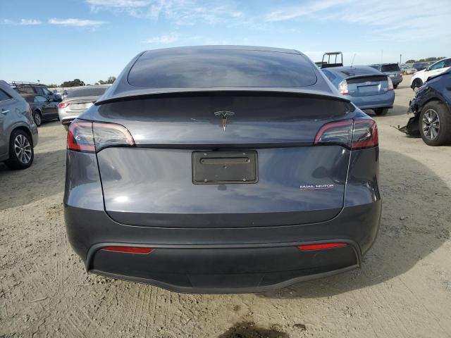 Photo 6 from auction – 2023 TESLA MODEL Y with VIN 7SAYGDEFXPF850123