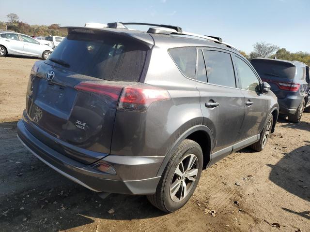 Photo 3 from auction – 2016 TOYOTA RAV4 XLE with VIN JTMRFREV4GJ077618
