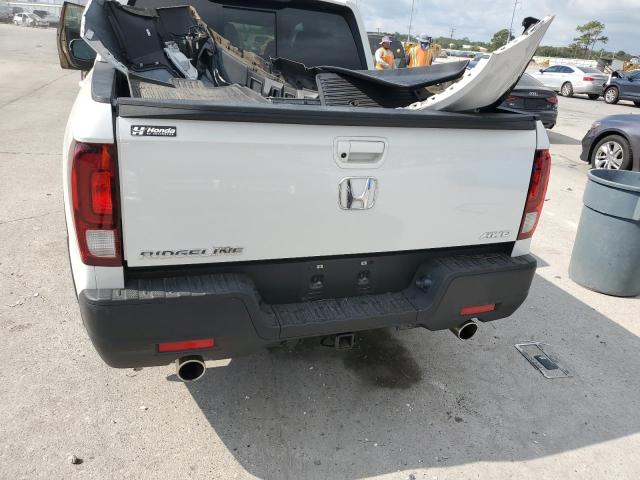 Photo 6 from auction – 2023 HONDA RIDGELINE with VIN 5FPYK3F53PB025107