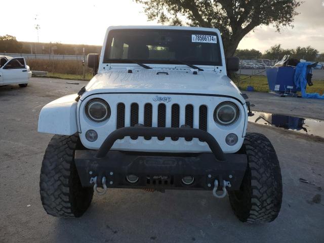 Photo 5 from auction – 2015 JEEP WRANGLER U with VIN 1C4BJWEGXFL614205