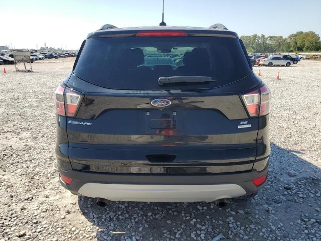 Photo 6 from auction – 2018 FORD ESCAPE SE with VIN 1FMCU0GD9JUA04547