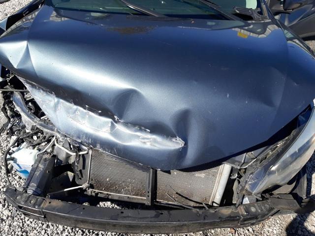 Photo 11 from auction – 2014 TOYOTA COROLLA EC with VIN 2T1BPRHEXEC060910