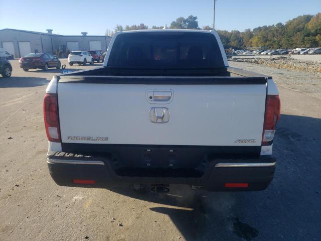 Photo 6 from auction – 2020 HONDA RIDGELINE with VIN 5FPYK3F77LB002473