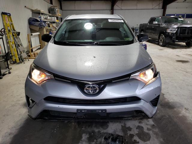 Photo 5 from auction – 2018 TOYOTA RAV4 LE with VIN 2T3BFREV8JW850178