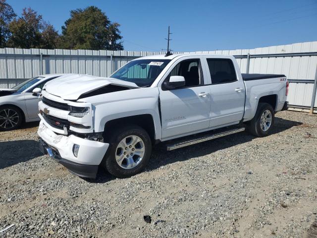 CHEVROLET SILVERADO 2018 with VIN 3GCUKREC6JG297775 - Photo from auction