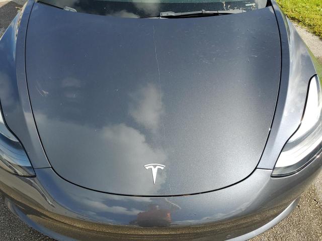 Photo 11 from auction – 2022 TESLA MODEL 3 with VIN 5YJ3E1EC7NF318908
