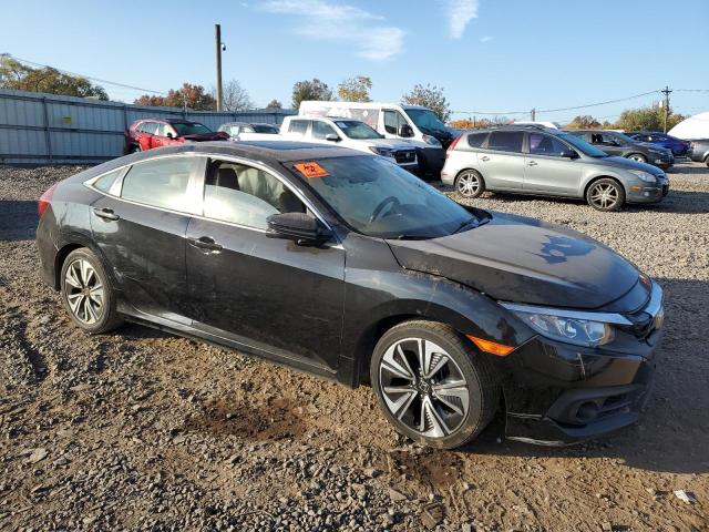Photo 4 from auction – 2018 HONDA CIVIC EX with VIN JHMFC1F31JX020337