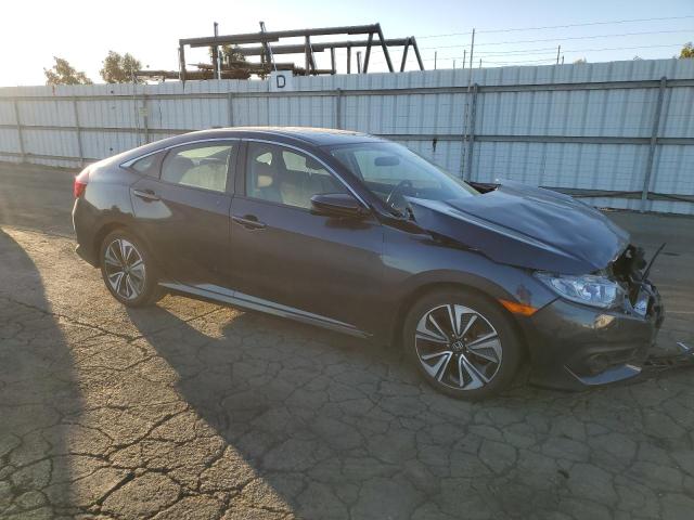 Photo 4 from auction – 2018 HONDA CIVIC EX with VIN JHMFC1F37JX018849