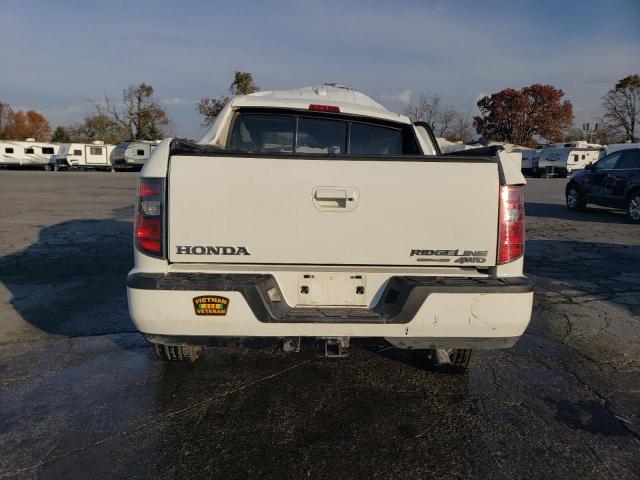 Photo 6 from auction – 2014 HONDA RIDGELINE with VIN 5FPYK1F68EB010404