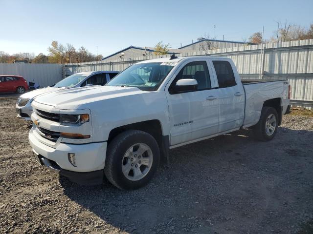 CHEVROLET SILVERADO 2018 with VIN 2GCVKREC9J1102717 - Photo from auction