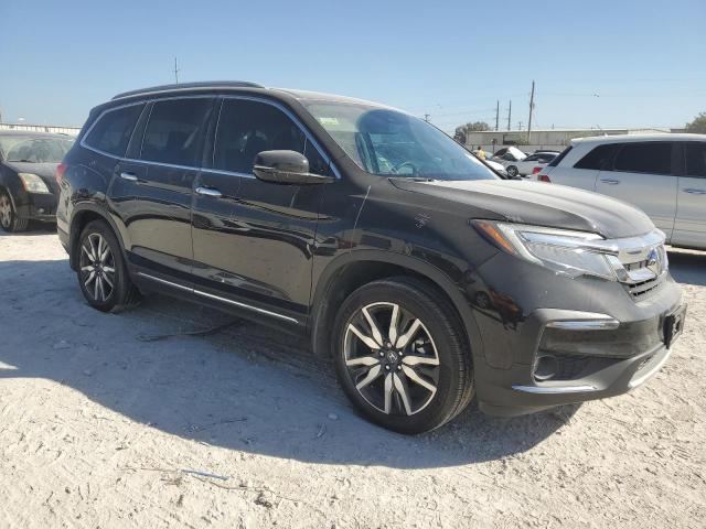Photo 4 from auction – 2022 HONDA PILOT TOUR with VIN 5FNYF5H94NB004398