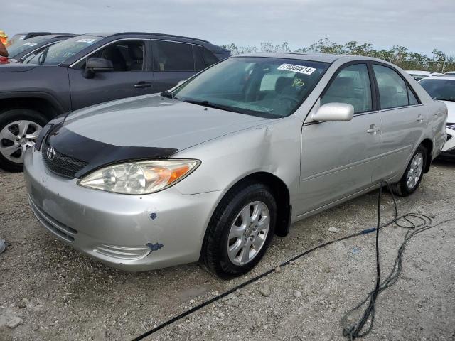 TOYOTA CAMRY LE 2004 with VIN 4T1BF32K84U575044 - Photo from auction