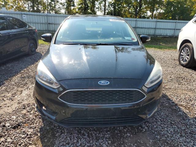 Foto 5 de la subasta – 2015 FORD FOCUS SE con VIN 1FADP3F21FL213687