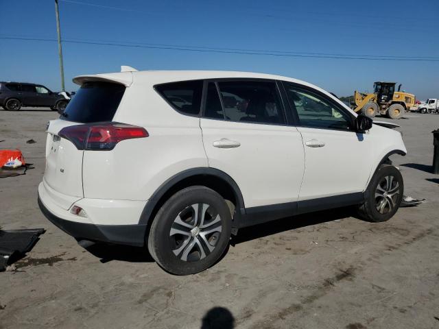 Photo 3 from auction – 2018 TOYOTA RAV4 LE with VIN JTMZFREV2JJ176980