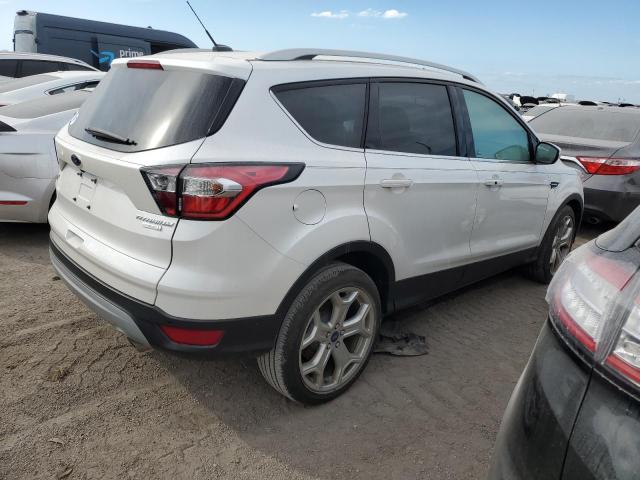 Photo 3 from auction – 2017 FORD ESCAPE TIT with VIN 1FMCU0J94HUB37019