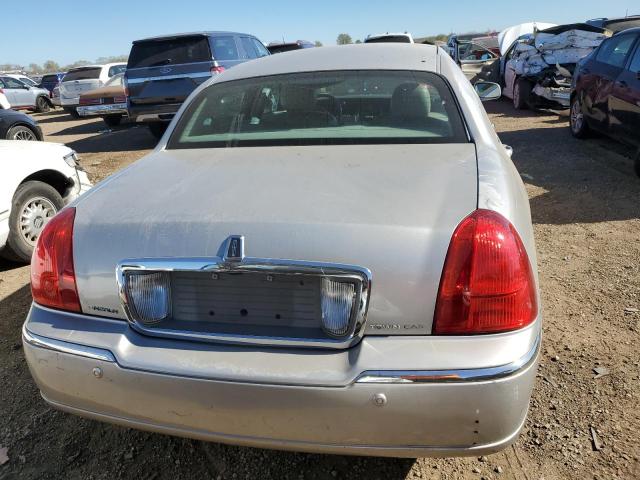 Photo 6 from auction – 2004 LINCOLN TOWN CAR E with VIN 1LNHM81W04Y674645