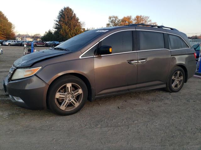 HONDA ODYSSEY TO 2011 with VIN 5FNRL5H98BB094129 - Photo from auction