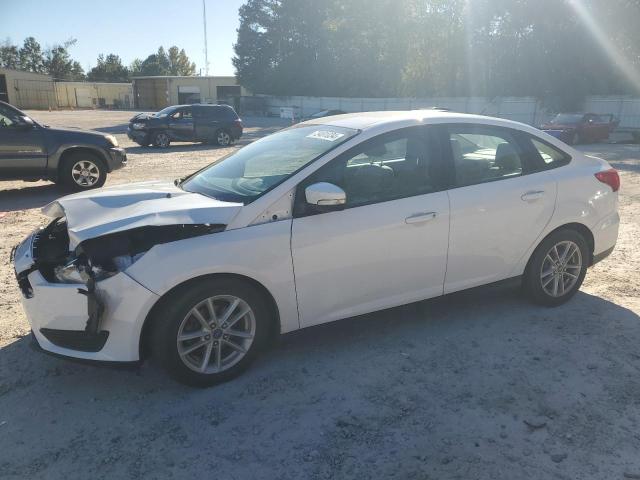 FORD FOCUS SE 2016 with VIN 1FADP3F28GL210805 - Photo from auction