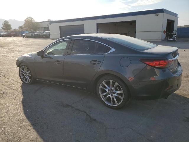 Photo 2 from auction – 2014 MAZDA 6 TOURING with VIN JM1GJ1V6XE1128553