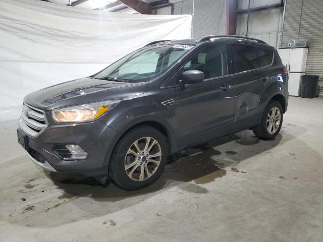 FORD ESCAPE SE 2018 with VIN 1FMCU0GD7JUD38124 - Photo from auction